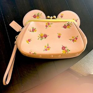 It is a light pink color with floral pattern